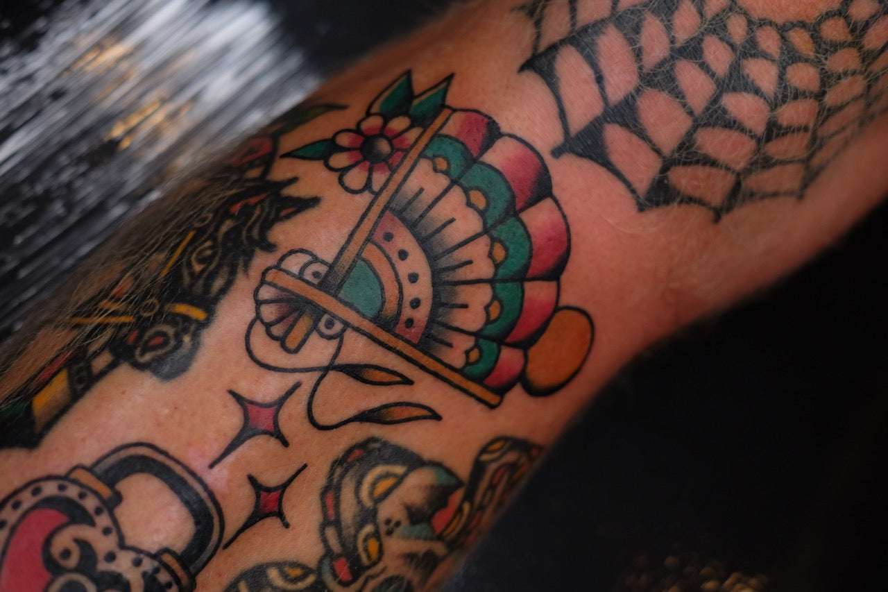 American Traditional Tattoo Explained: Origins, Symbols & Timeless Designs